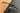 Close-up of a bicycle handlebar on a sidewalk