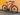 Vvolt Centauri ebike against a yellow wall.